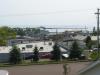 The view of downtown Grand Marais, the harbor and Lake Superior from his place.